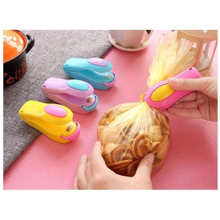 Mini Máquina Seladora de Plástico Lacre Fácil + Ímã de Geladeira comprar Mini Máquina Seladora de Plástico Lacre Fácil + Ímã de Geladeira original Vovó Lúcia